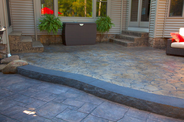 Two Tiered Concrete Patio with Border